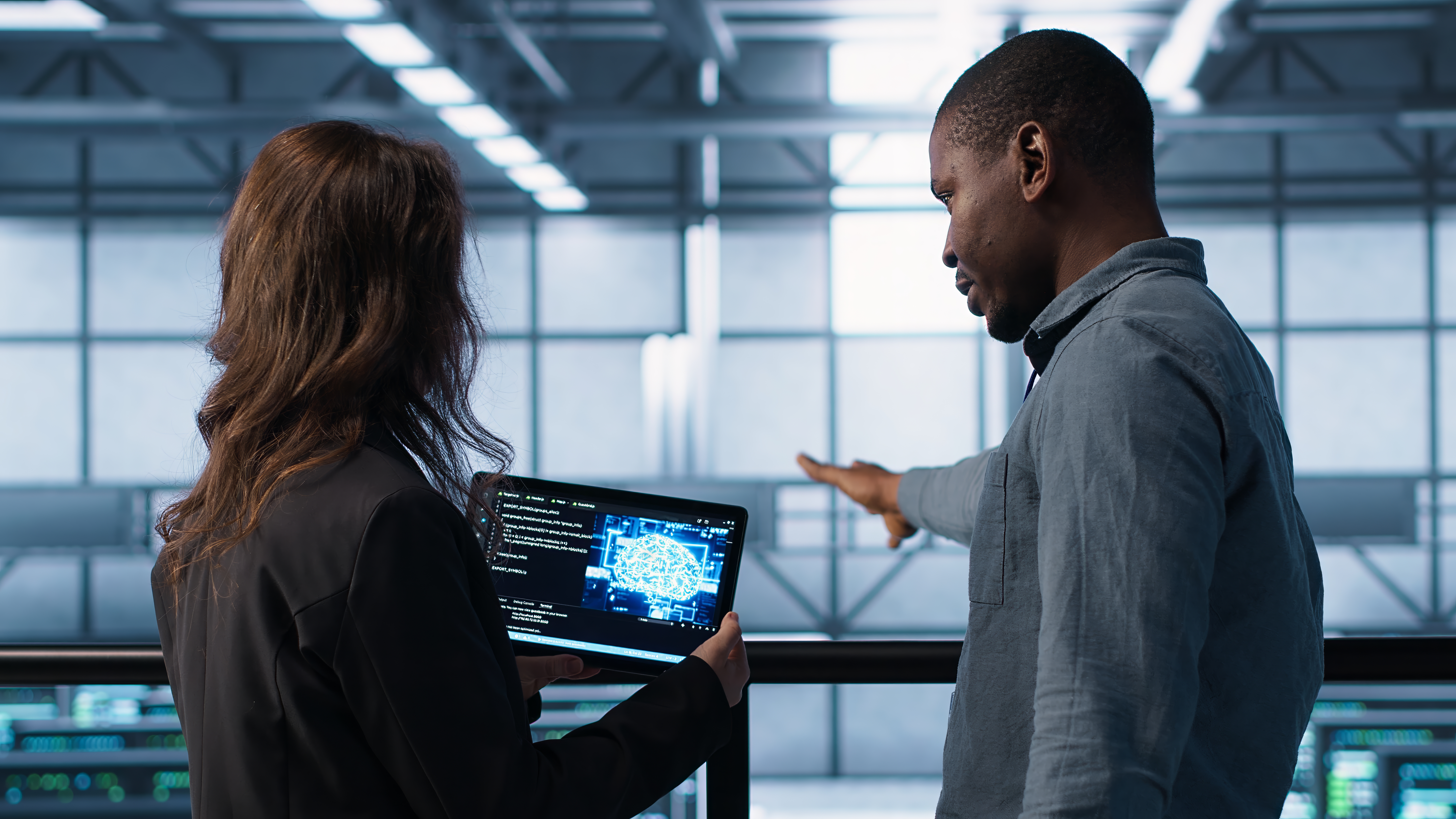 data-center-technicians-deploying-ai-driven-management-tools-using-tablet