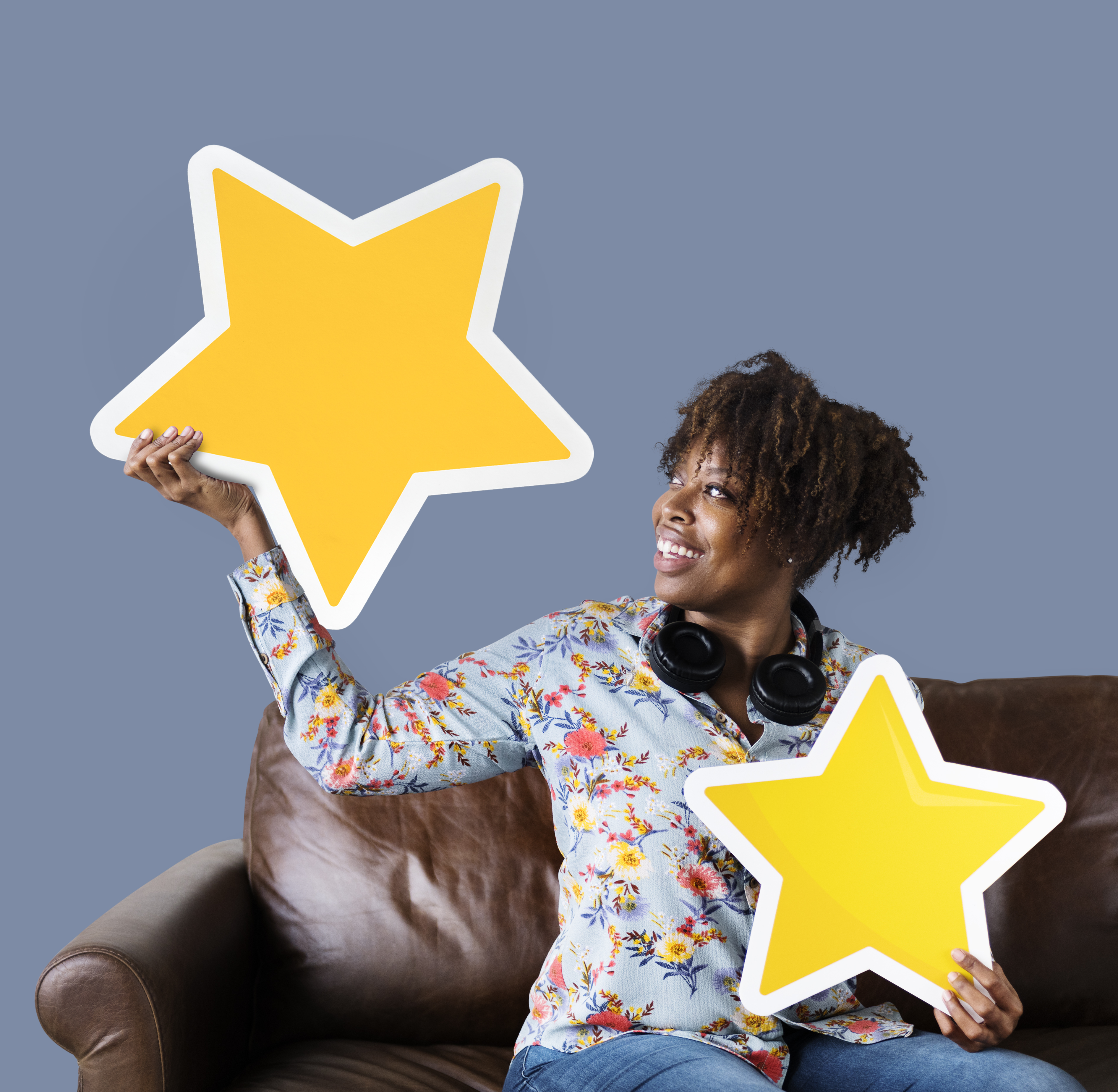 cheerful-woman-holding-golden-stars-icons