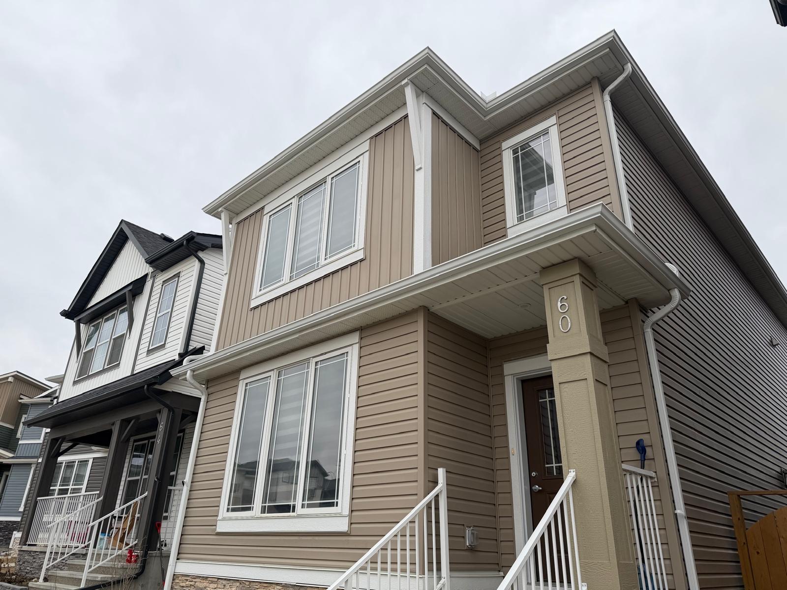 Manzon Construction | Stucco | Best Roofing & Hardie Board Company Calgary | Vinyl Siding Contractor Calgary